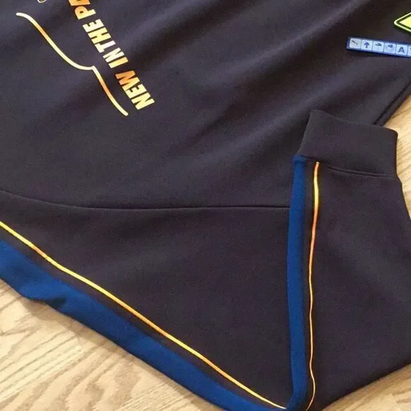 NWT PUMA sweatshirt in brown with blue & orange